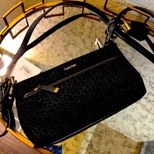 Calvin Clein Crossbody logo embossed purse